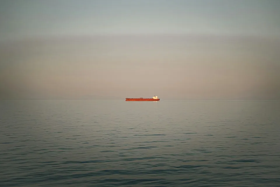 A cargo ship on a calm sea